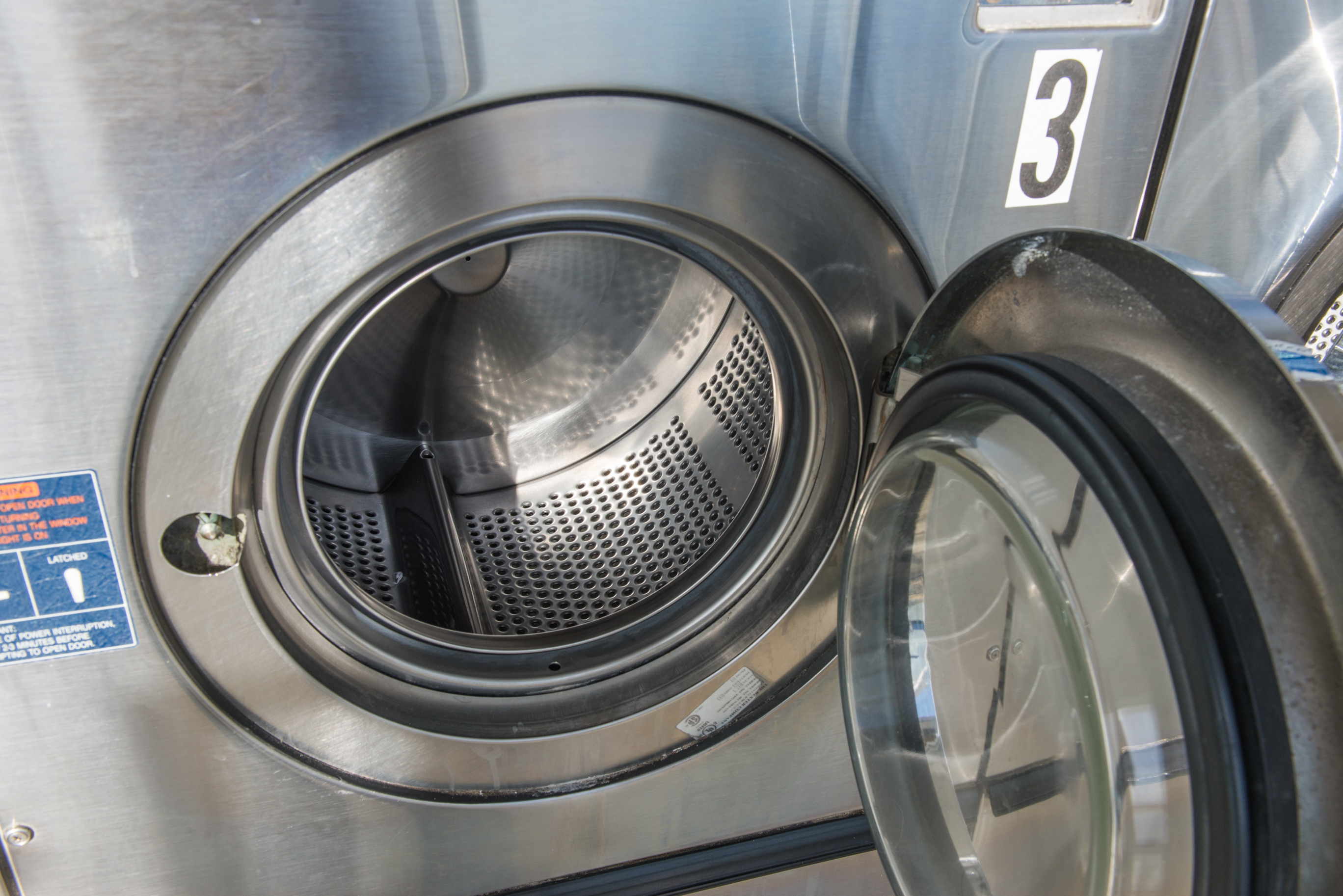 Business of industrial laundry machines in launderette store
